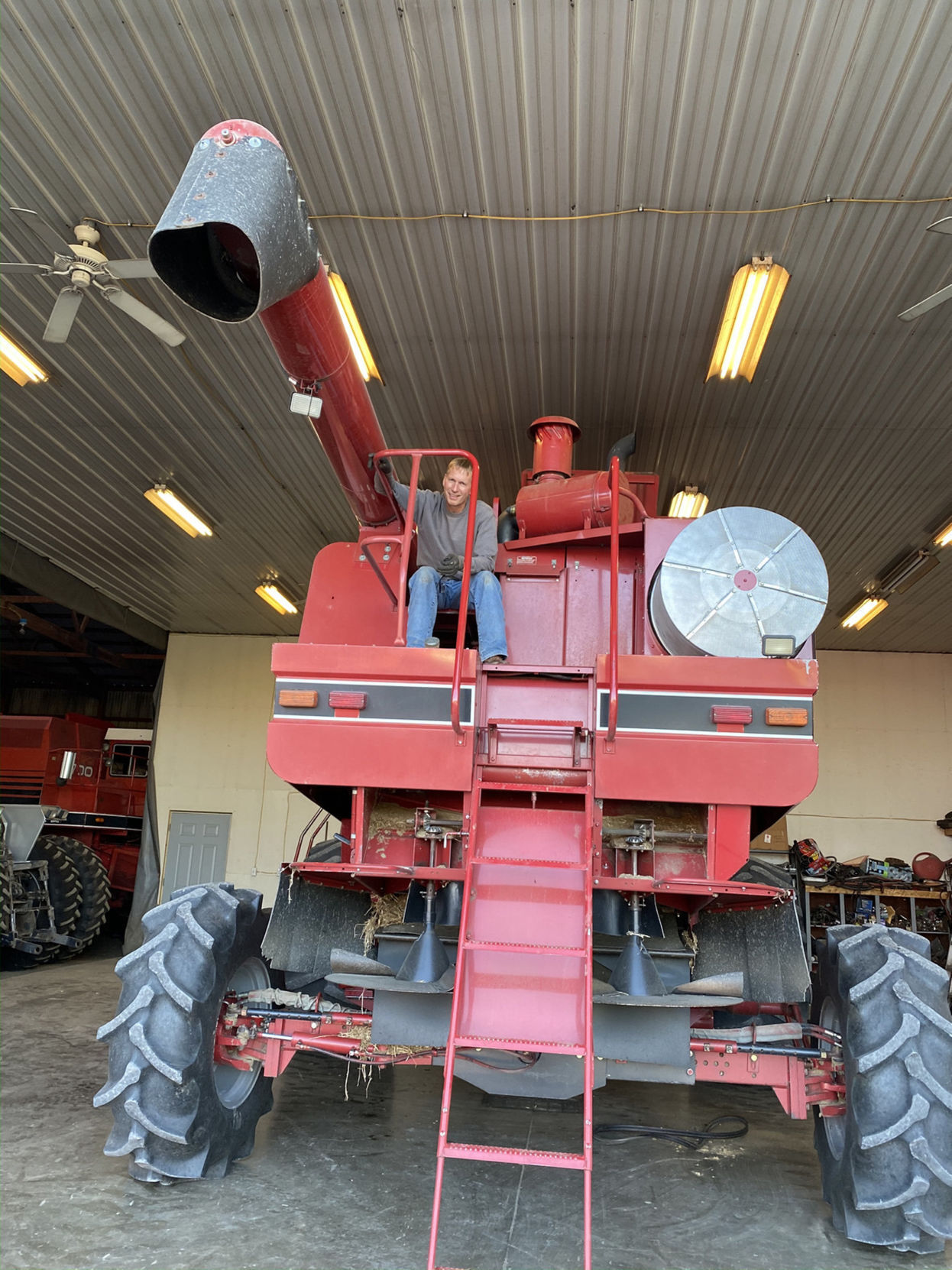 Scott Ziegler on the back of a combine.jpg